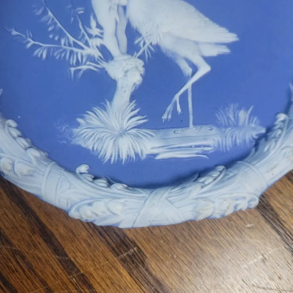 Schafer & Vater Blue & White Jasperware Plaque Featuring a Cherub & Stork Lily